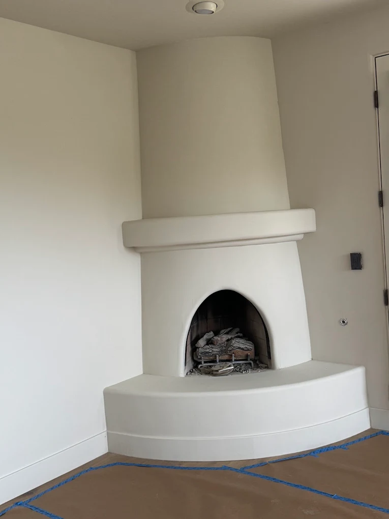 Smooth-finish corner fireplace